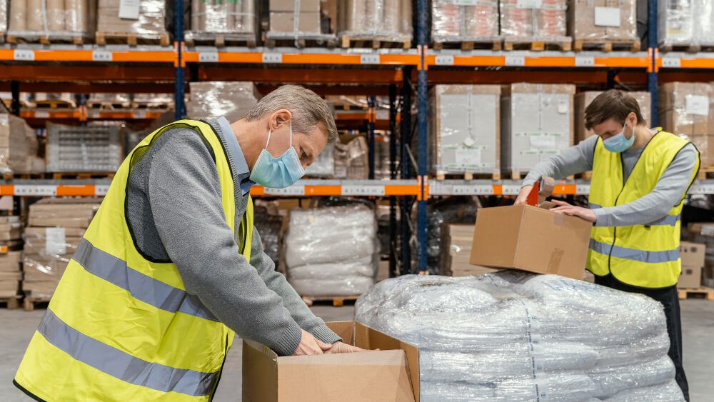 man-warehouse-working-with-packages (1)